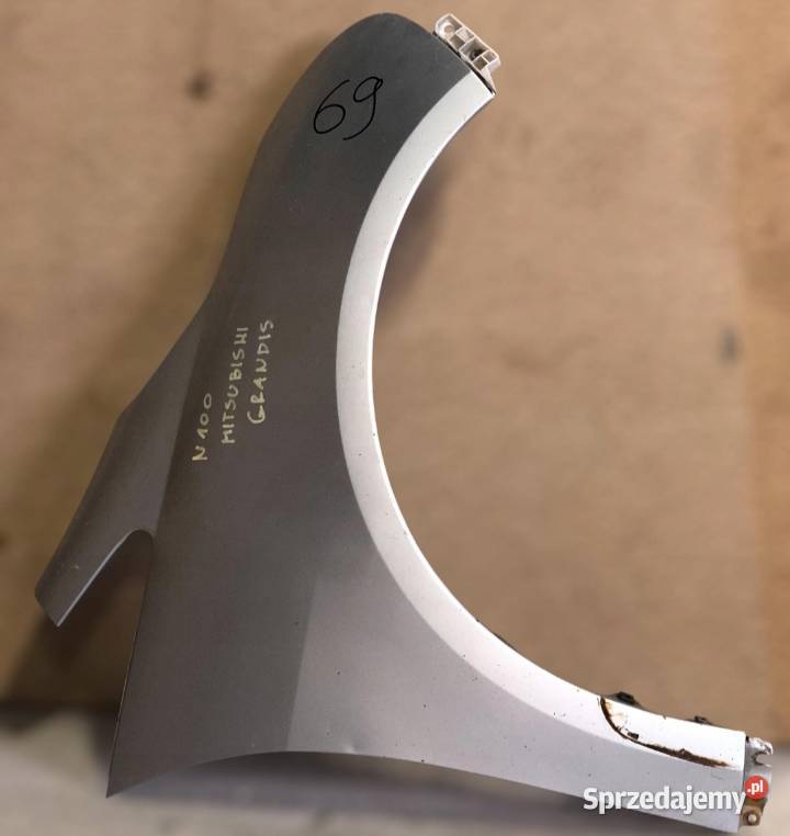 BŁOTNIK PRZEDNI PRAWY MITSUBISHI GRANDIS osobowe Skołoszów