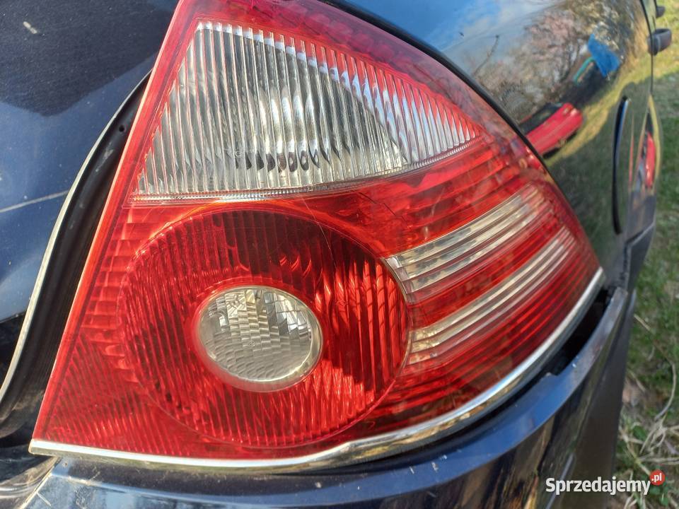 Lampa prawa lewa tył zderzak tył drzwi prawy tył Iwanowice Dworskie