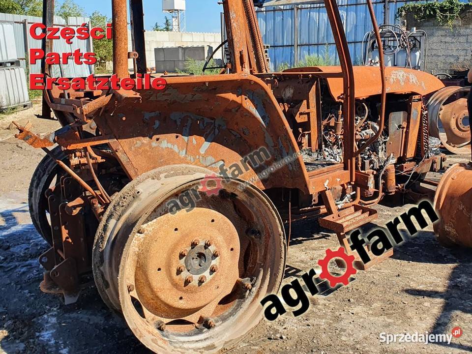 Holland TL100 części silnik skrzynia biegów Byków