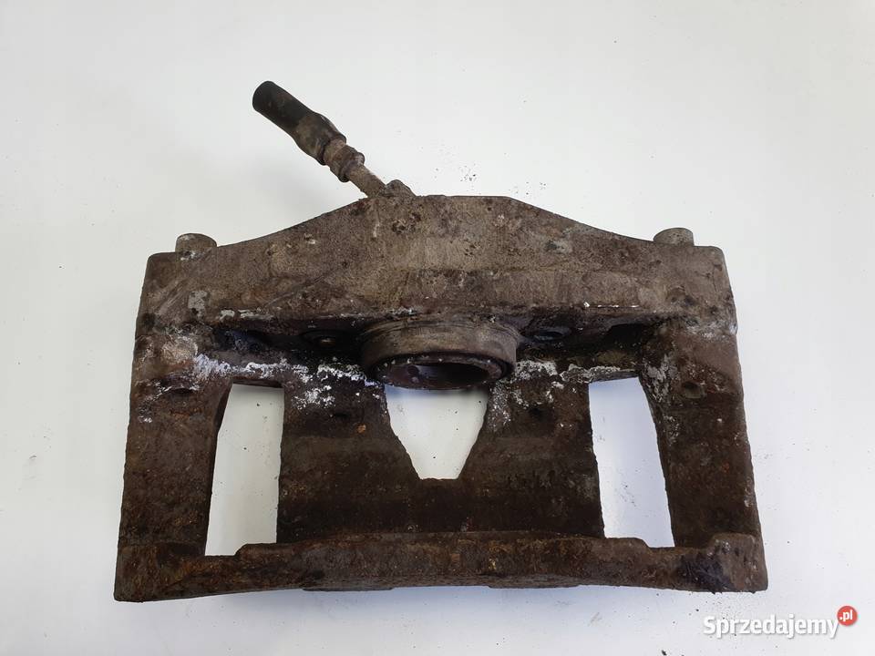 Volvo XC90 I PRZEDNI ZACISK HAMULCOWY lewy przód osobowe Chełm