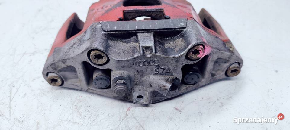 ZACISK HAMULCOWY PRAWY AUDI A6 C6 974 320MM osobowe Przystajń