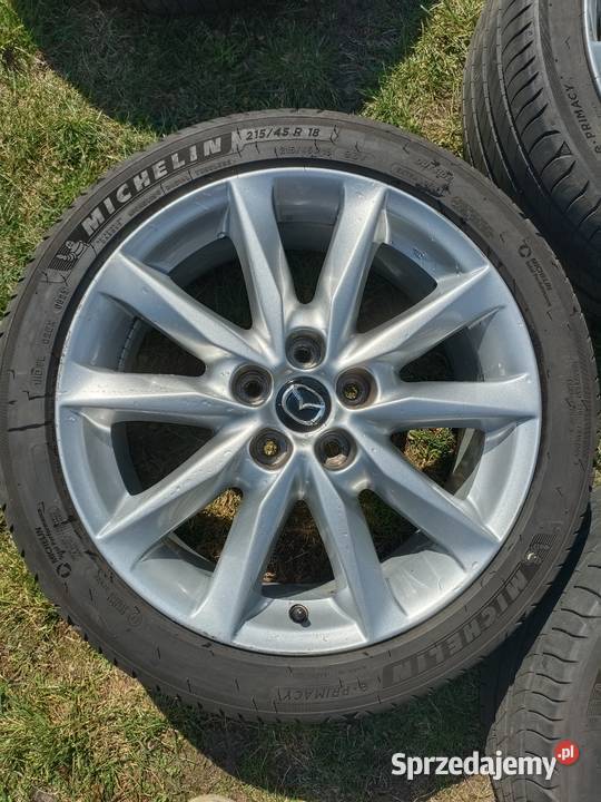 Felgi Mazda 18 5x1143 opony Michelin 21545 R18