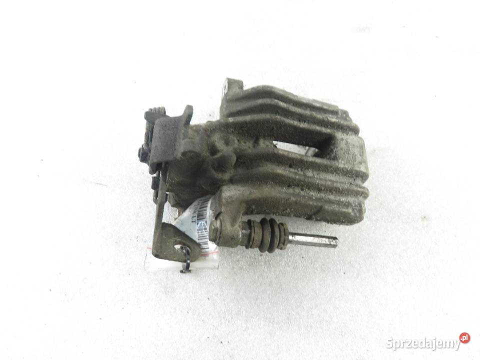 ZACISK LEWY TYŁ AUDI A6 C5 19 TDI sprzedam