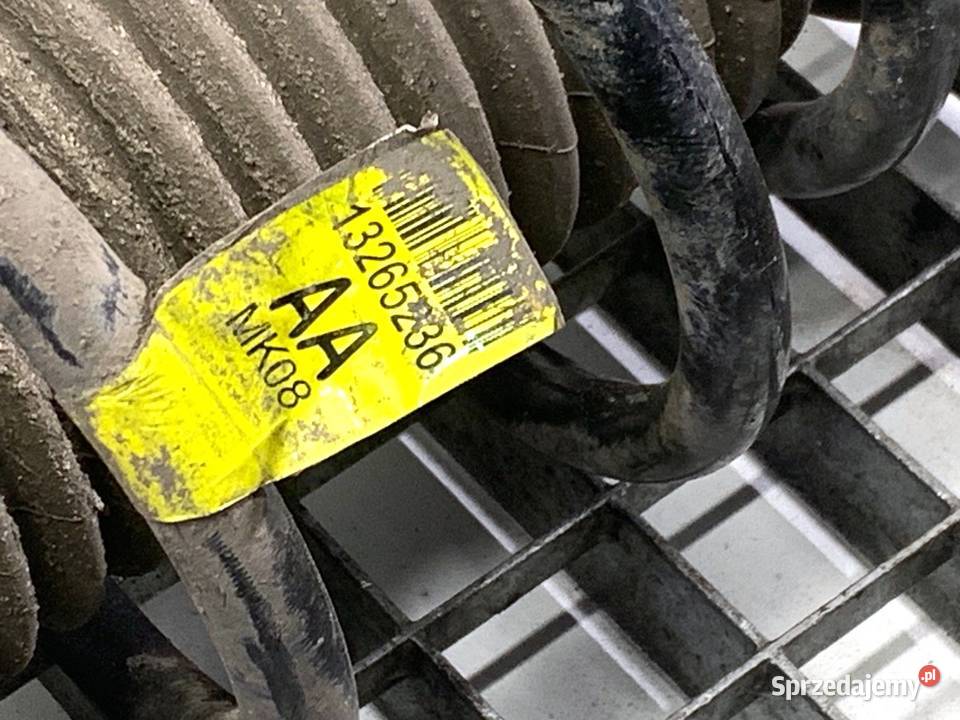 AMORTYZATOR LEWY PRZÓD ZE SPRĘŻYNĄ CHEVROLET