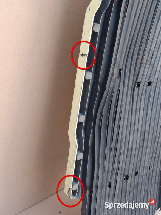 MAN TGA TGX BŁOTNIK KOŁO PRZÓD LEWY LISTWA Bieleń