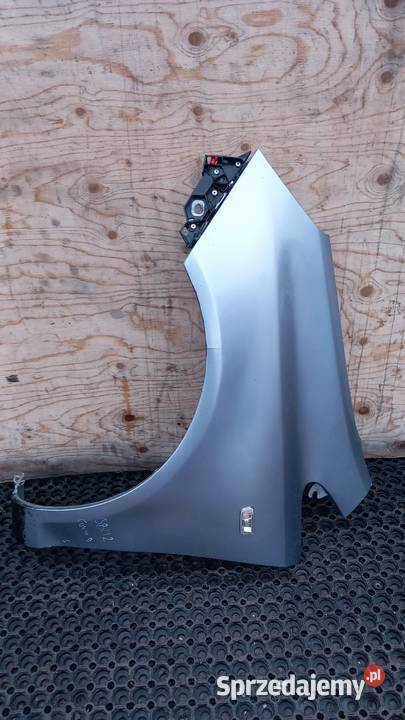 OPEL CORSA D BŁOTNIK PRZÓD LEWY Z163 Zbierkowo