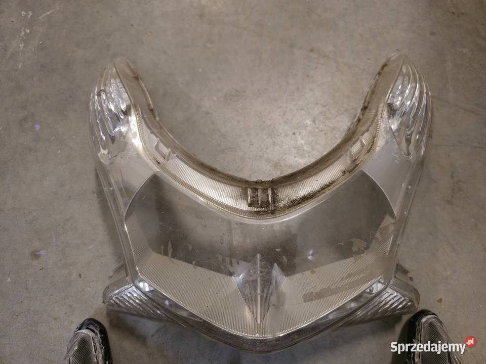 Honda PCX 0913 lampa przednia reflektor oryginał Reflektory i halogeny Łódź