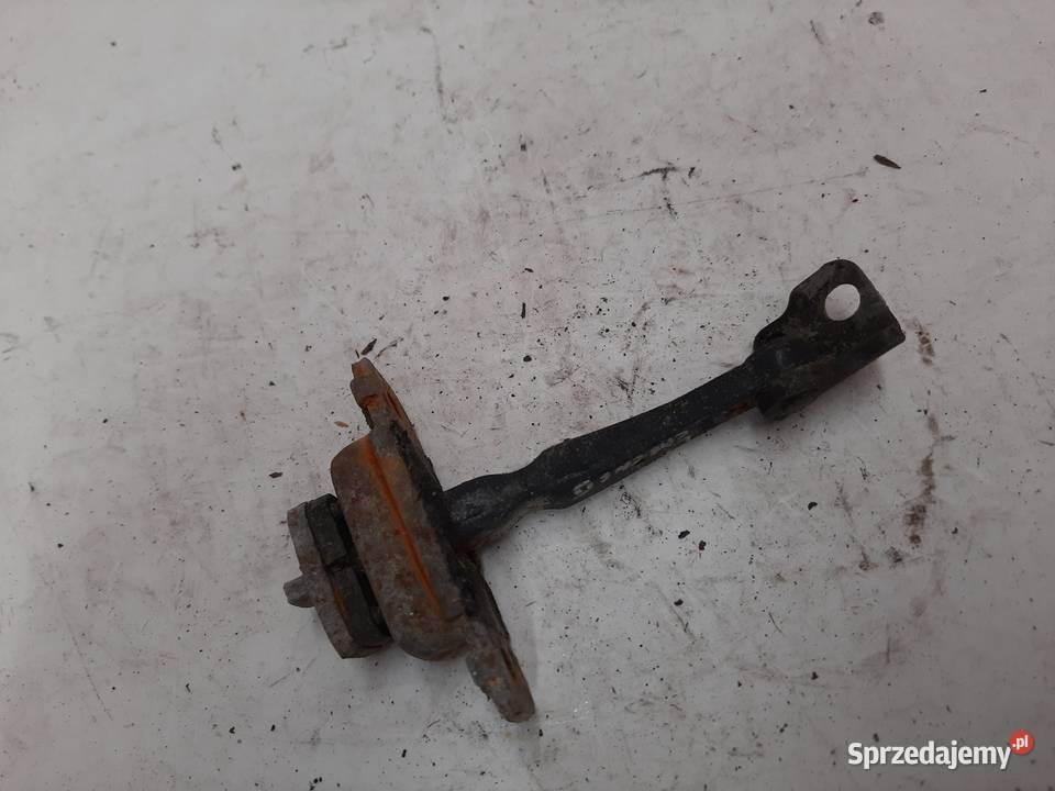 Kia Carens II Lewy Przedni ogranicznik drzwi Ksawerów