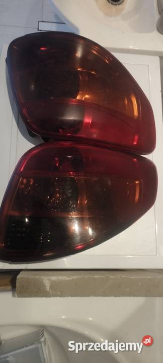 Lampy tył SUZUKI SX4 FIAT SEDICI 0614 Szewna sprzedam