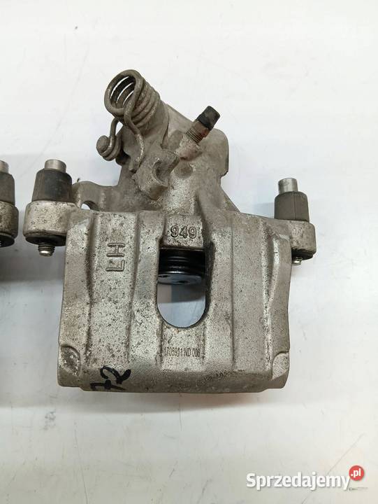 ZACISK HAMULCOWY LEWY PRAWY TYŁ KPL Ford Focus osobowe