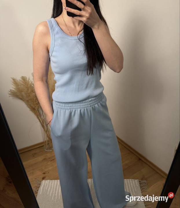 Błękitny prążkowany top na ramiączkach rozmiar Ostrzeszów