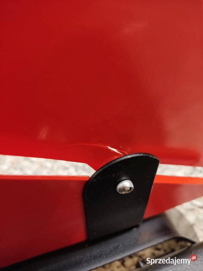 Trójkąt ostrzegawczy Honda z czarną walizką Głuchołazy