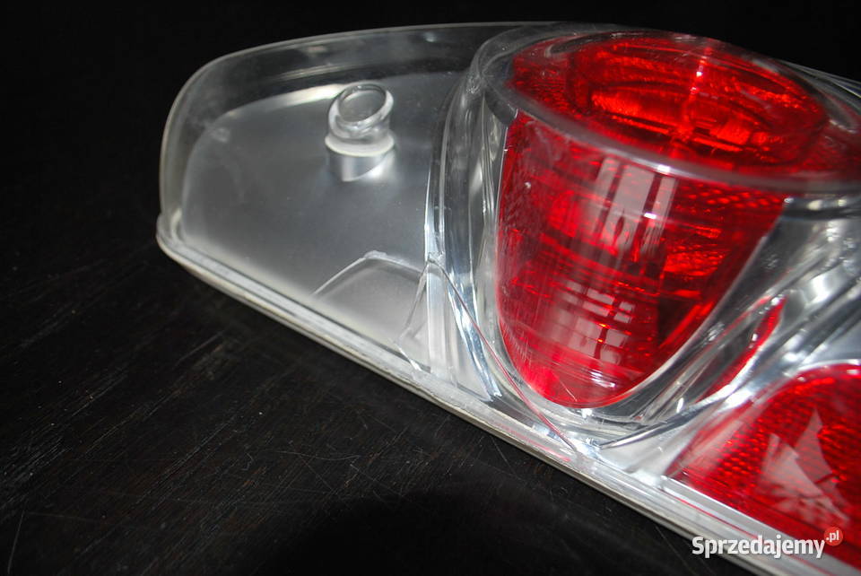 USZKODZONA LAMPA HELLA CARALUNA Grzebowilk