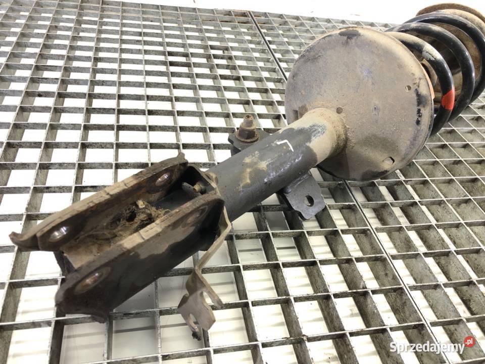 AMORTYZATOR LEWY PRZÓD SPRĘŻYNA DACIA DUSTER 15 osobowe