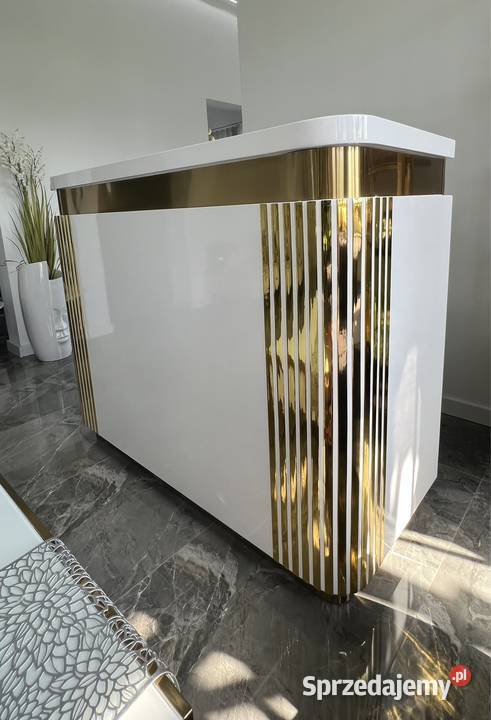 Nowoczesna lada recepcja biała złota do salonu Kosmetyka i fryzjerstwo