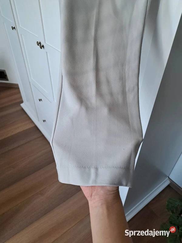 Beżowe eleganckie spodnie Maison dAmlie Paris EU Rozmiar 38(M) Trąbki Wielkie