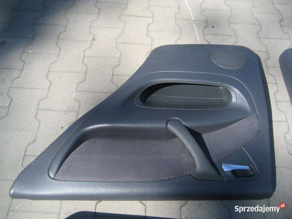 mercedes ml 163 lift 0105r tapicerka drzwi przód Deski rozdzielcze, konsole sprzedam