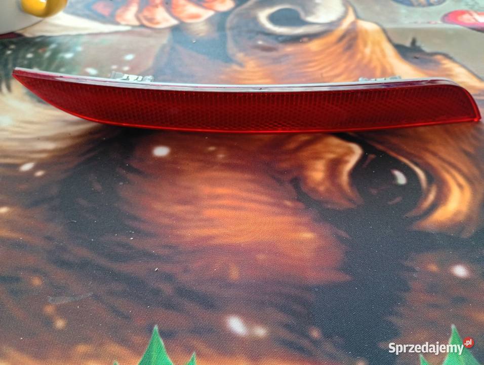 BMW F10 odblask zderzaka tył lewy 7203237