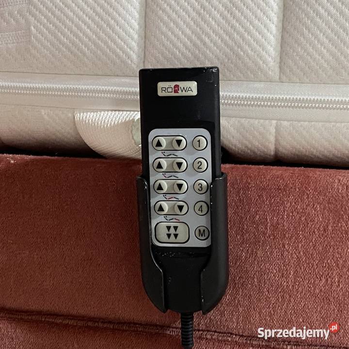 Łóżko z tapicerowanym zagłówkiem stelaże elektr Gryfice