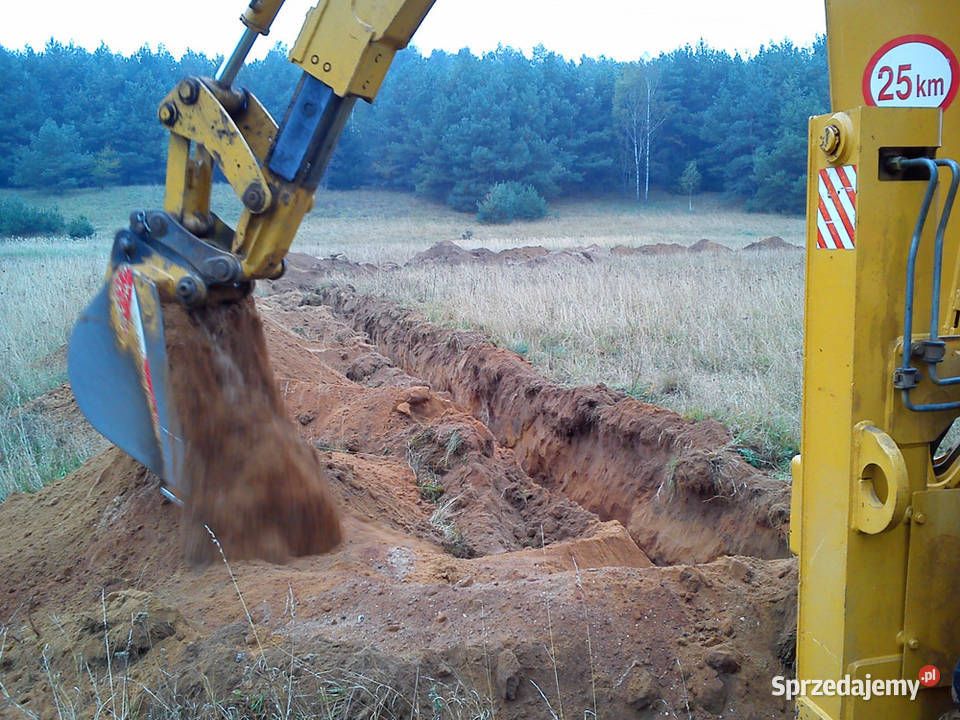 Usługi koparkoładowarką CAT Usługi transportowe