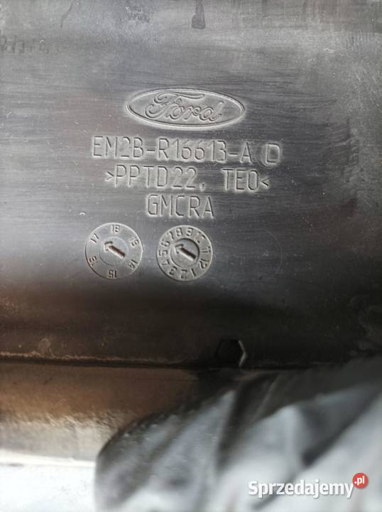 OSŁONA GÓRNA PASA PRZEDNIEGO EM2BR16613AD Ford S