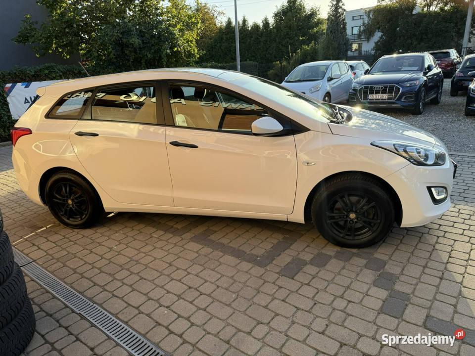 Hyundai i30 Rej012013 14 100 Klimatyzacja II Samochody osobowe Orzech