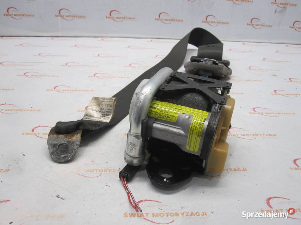 MITSUBISHI L200 07r pas bezpieczeństwa lewy Motoryzacja