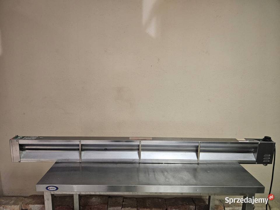 Lampa grzewcza podwieszana pod bemar wydawkę APW