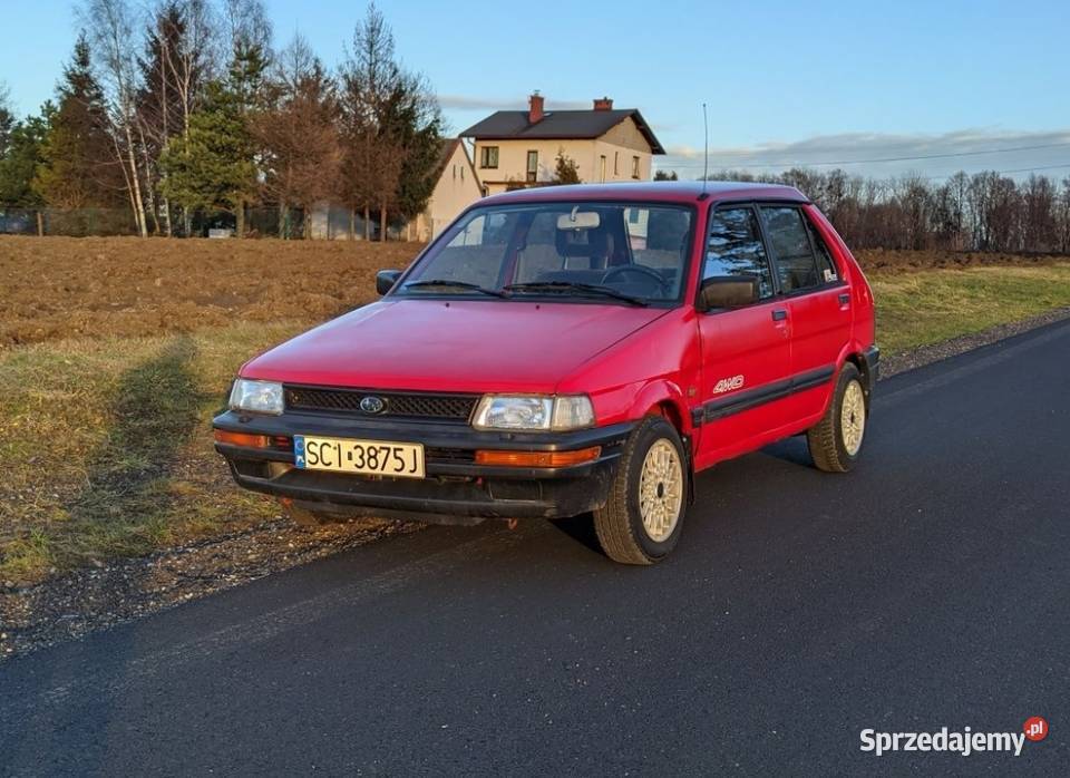 Subaru justy kad I 10 4WD Manual 1991r czerwony Ochaby Wielkie