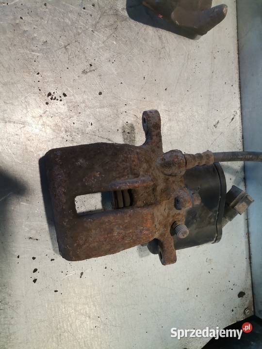 AUDI A6 C6 ZACISK HAMULCOWY LEWY TYŁ