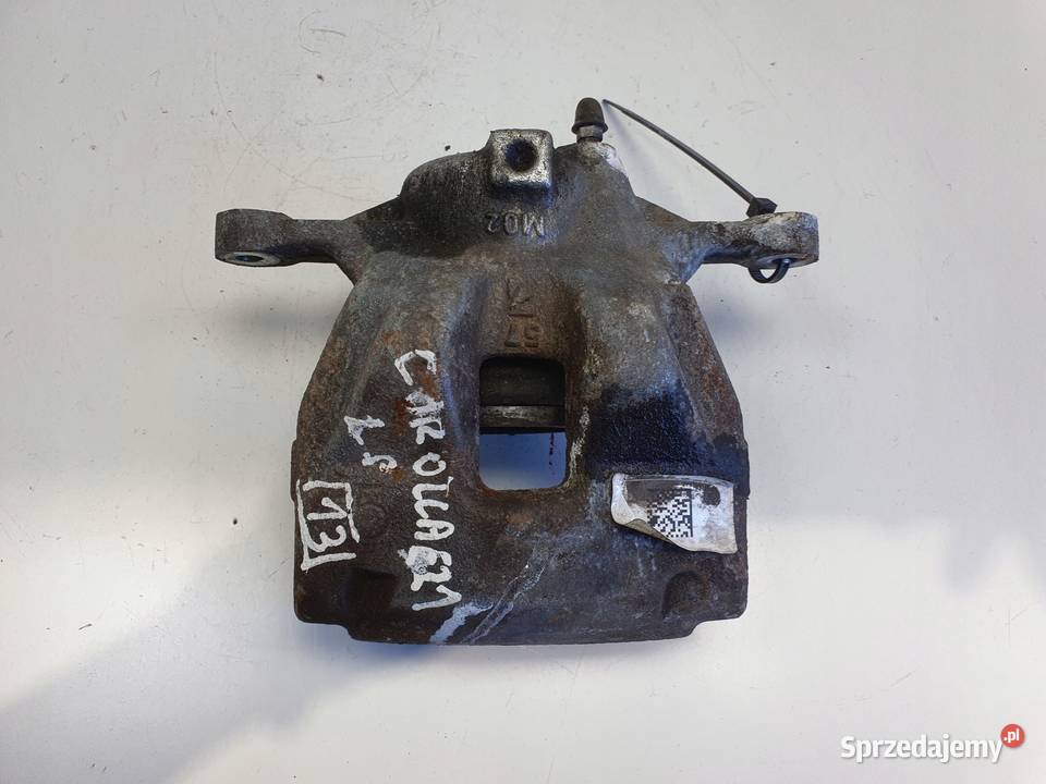 Toyota Corolla XII E21 PRZEDNI ZACISK HAMULCOWY osobowe Rudka