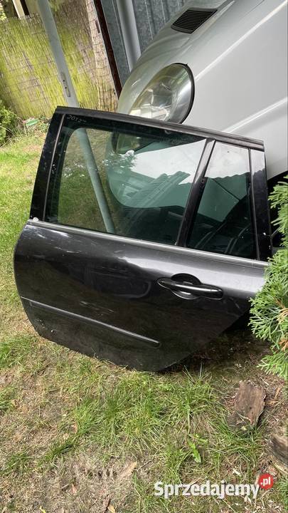 DRZWI lewe tylne RENAULT LAGUNA III NV676 5D Rok produkcji 2010 Części samochodowe sprzedam