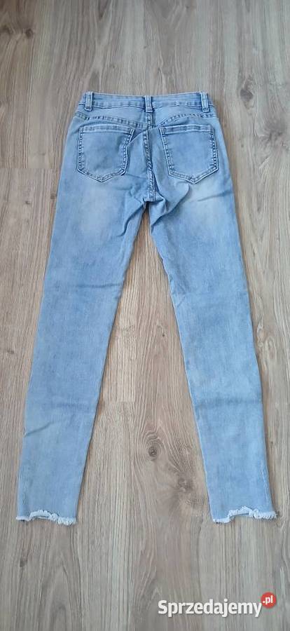 Jeansy z poszarpanymi nogawkami modne niebieski kujawsko-pomorskie Grudziądz