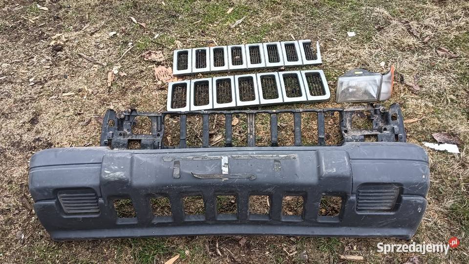 Zderzak Grill lewy reflektor Jeep Grand Cherokee Zderzaki