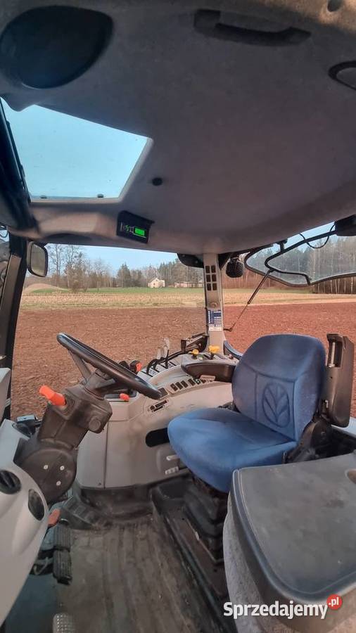 Holland T6050 TUZ i WOM przedni 5886 stan 1 wł Pneumatyczne siedzenie Kolnica