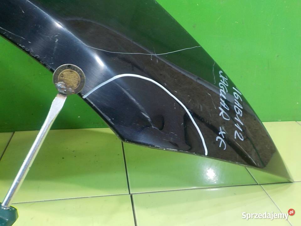 JAGUAR XE 20 D 15r SEDAN 4D blotnik prawy przod Suków