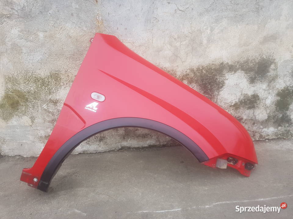 Suzuki Ignis MH 0410 błotnik przód przedni