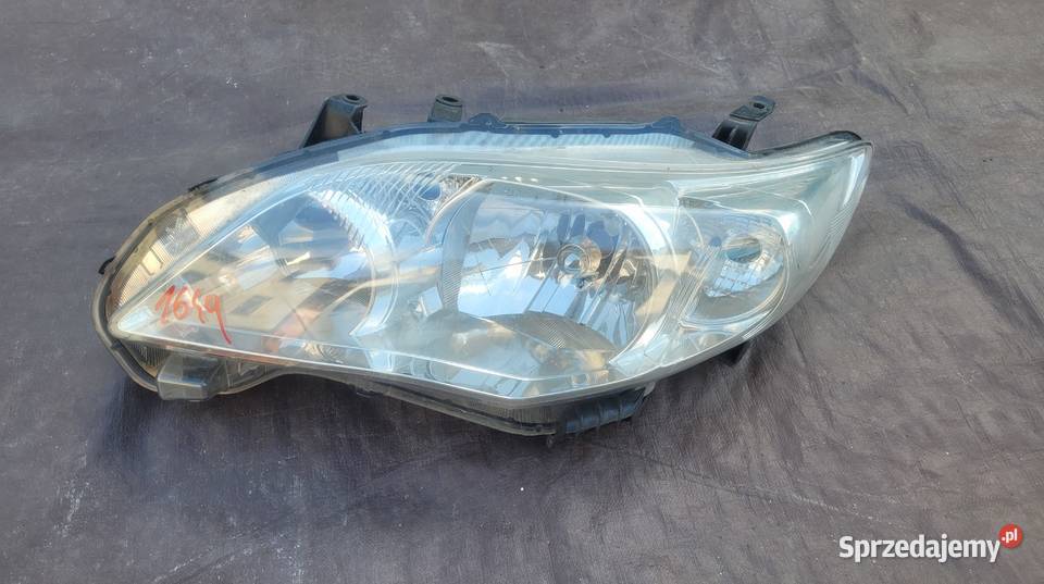 TOYOTA COROLLA E15 LAMPA REFLEKTOR LEWY PRZÓD