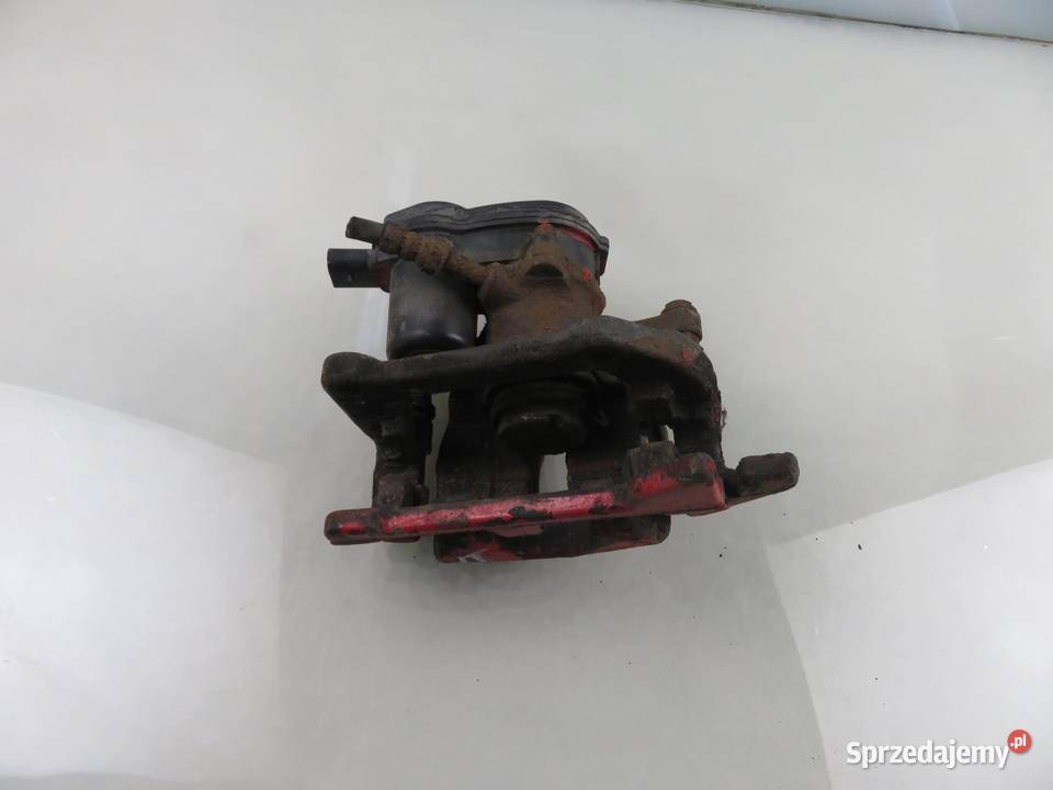 ZACISK LEWY TYŁ AUDI A4 B8 20 TDI 32335478