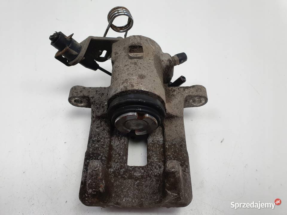 VW Golf IV Bora Audi A3 Toledo II LEWY ZACISK Chełm