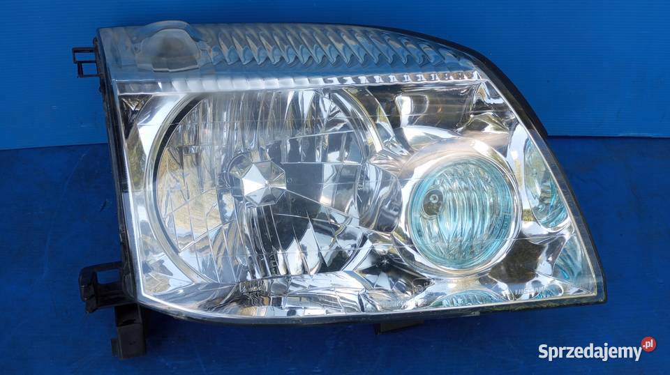 LAMPA REFLEKTOR PRAWY PRZÓD EU ORYGINAŁ NISSAN osobowe Nowy Tomyśl