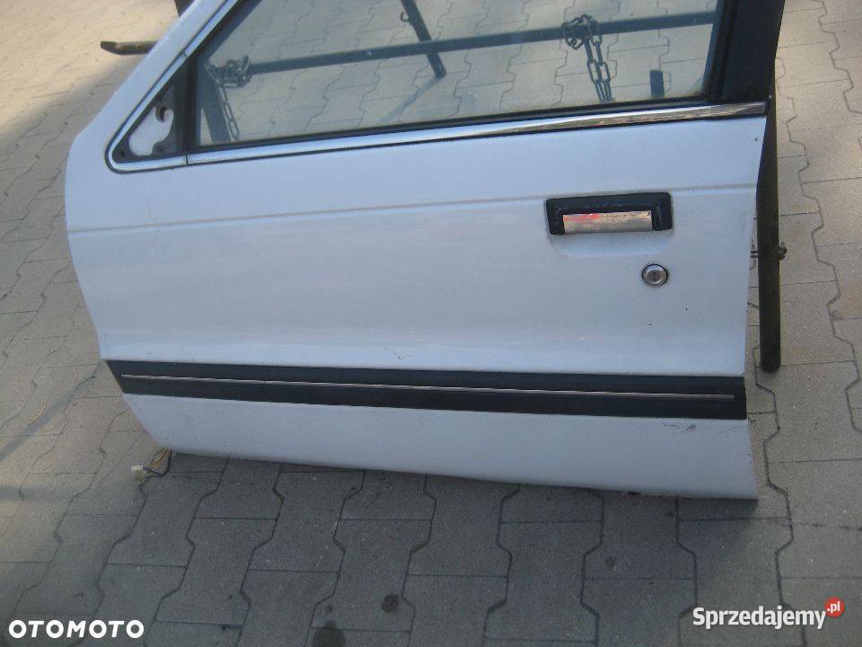 mitsubishi lancer 8891r drzwi przód lewe osobowe Rakoniewice