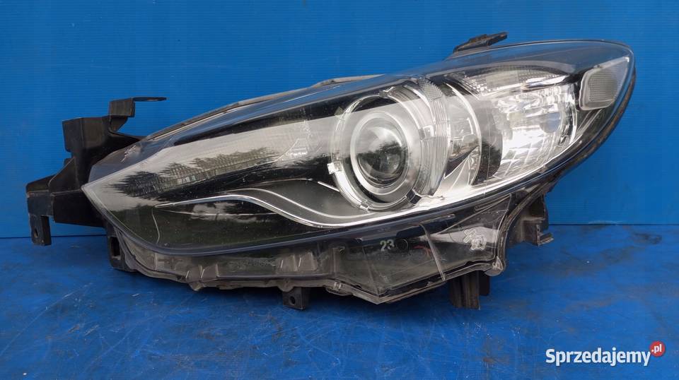 LAMPA REFLEKTOR LEWY PRZÓD EU XENON GHR451040 Lampy przednie Nowy Tomyśl sprzedam