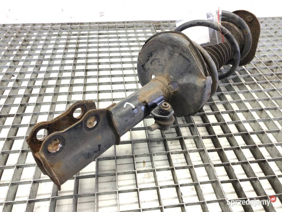 AMORTYZATOR LEWY PRZÓD ZE SPRĘŻYNĄ TOYOTA osobowe