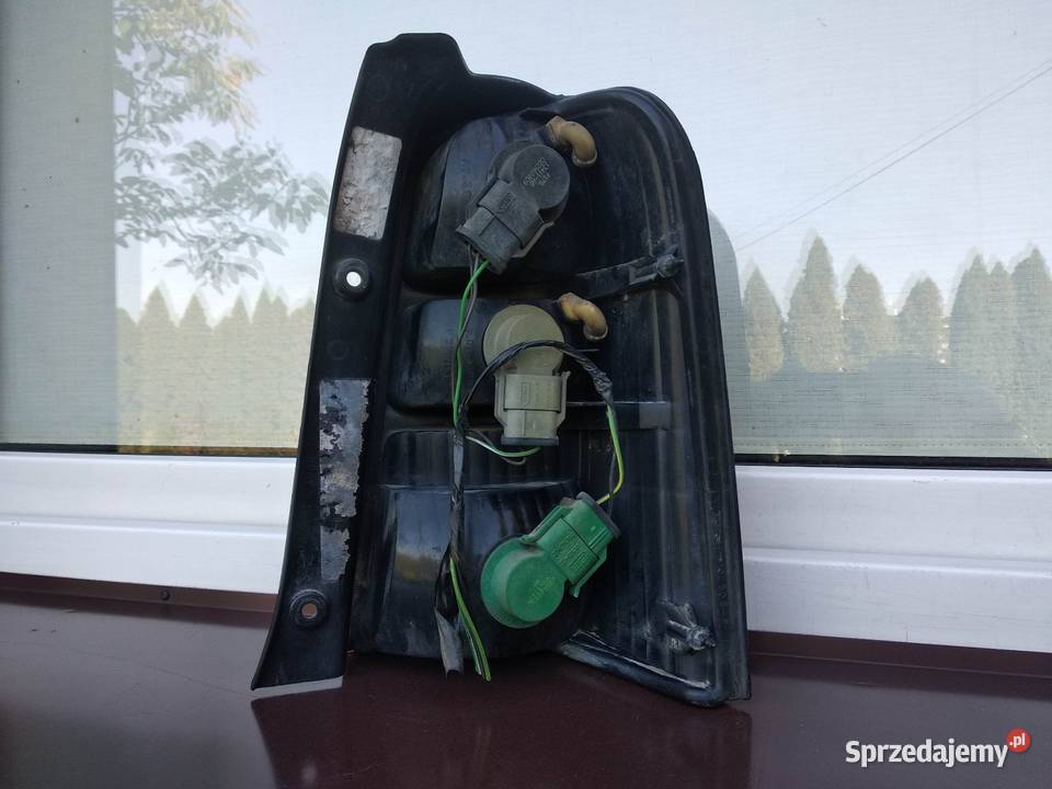 Ford Maverick 2 II lampa tył tylna lewa oryginał