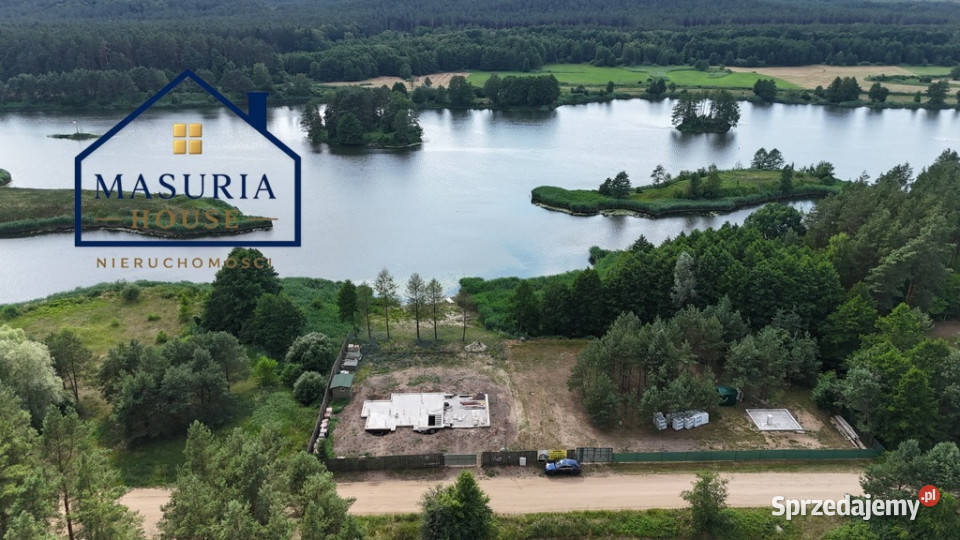 Działka z linią brzegową i rozpoczętą budową Nielbark
