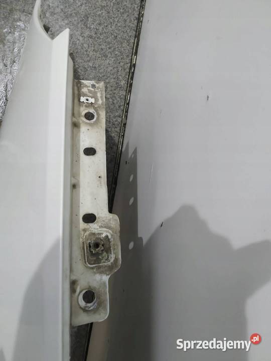 BŁOTNIK LEWY PRZÓD BIAŁY Opel Zafira III 2011