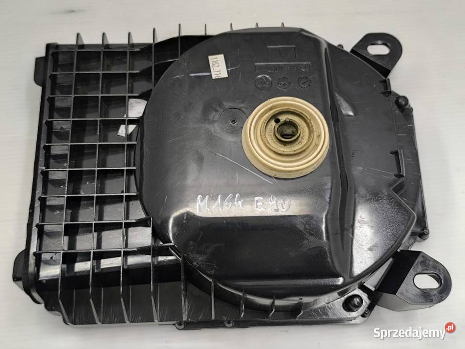 GŁOŚNIK NISKOTONOWY LEWY BMW E90 E91 6954871 Sprzęt audio fabryczny