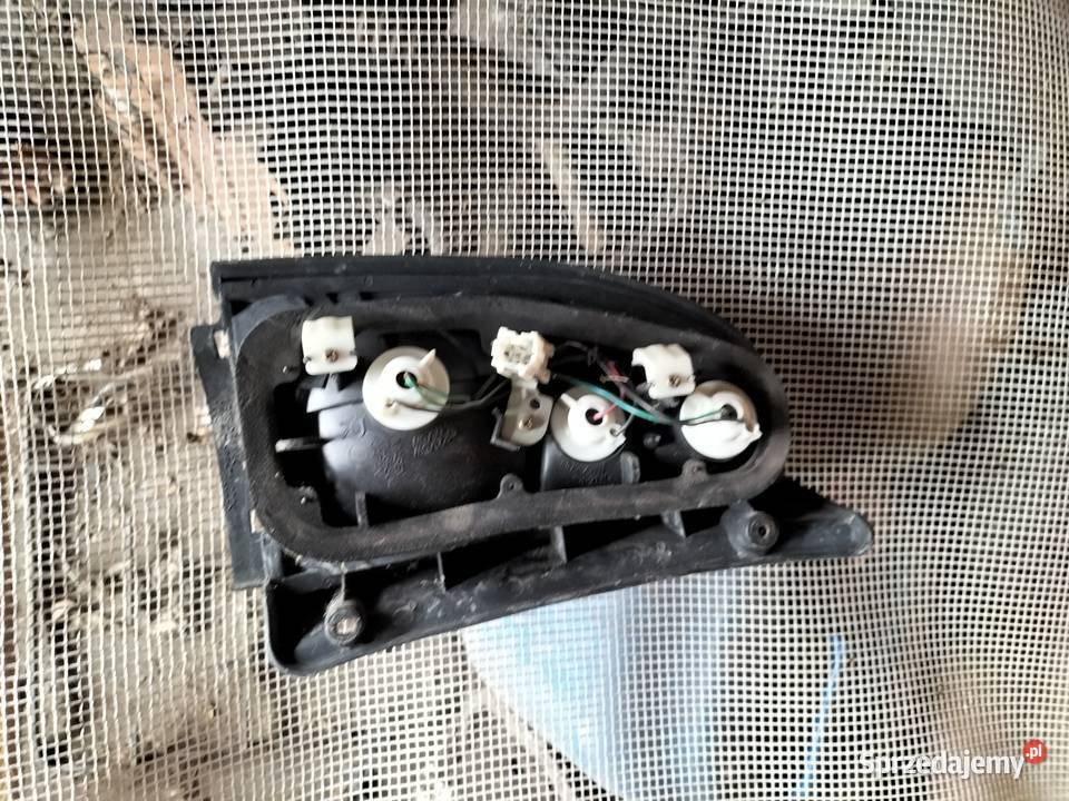 MITSUBISHI LANCER V LAMPA TYLNA PRAWA Oświetlenie Kamień-Kolonia