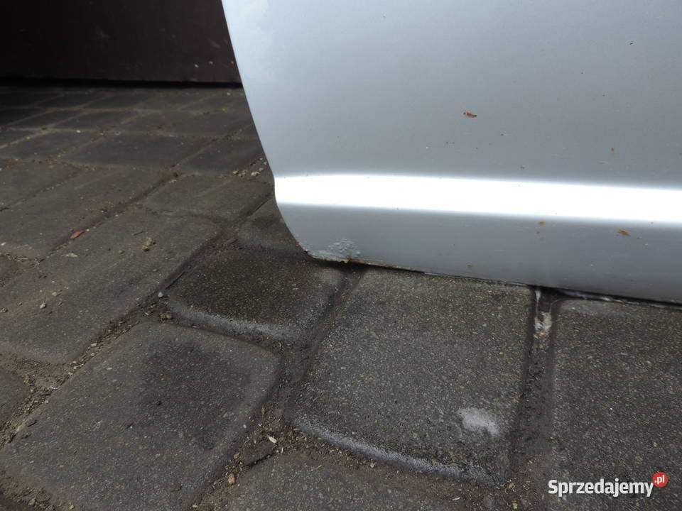 DRZWI LEWY PRZÓD TOYOTA YARIS I HB FL 1E7 Nowy Sącz